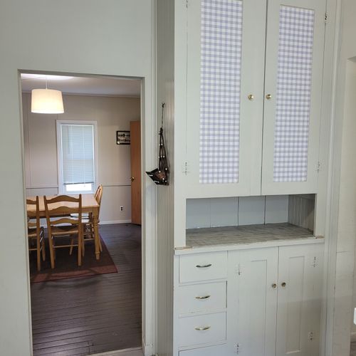 KITCHEN:  Looking out from the kitchen towards the dining room.  Note that there is lots of storage space!