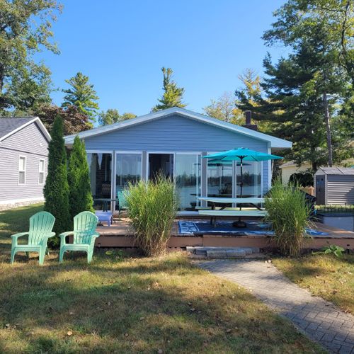 Exterior:  the back of the cottage, which faces the lake.