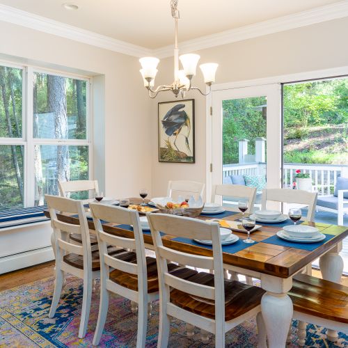 Dining for eight with easy access to the outdoor patio dining and gardens.