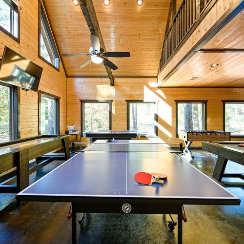 The game house is behind the main  house. Ping pong table pictured!