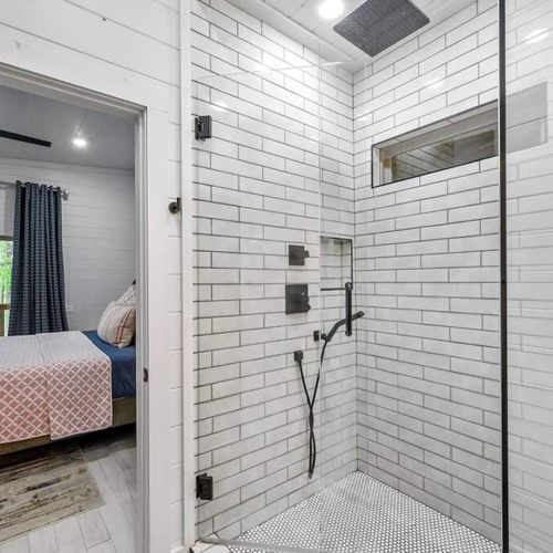 This full bathroom is equipped with a walk-in shower.