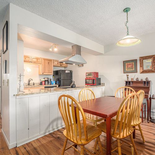 A breezy layout connects kitchen and dining—ideal for cooking, serving, and gathering with ease.