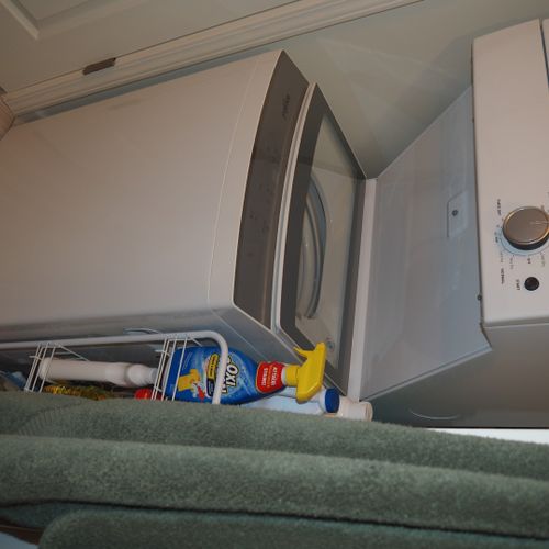 Bathroom:  full bathroom with a walk-in shower as well as a stacked washer and dryer.