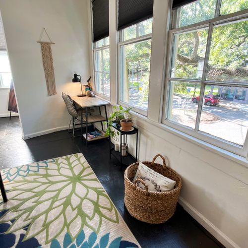 Sun-filled nook w/ a desk & garden views — your quiet work-from-home corner.