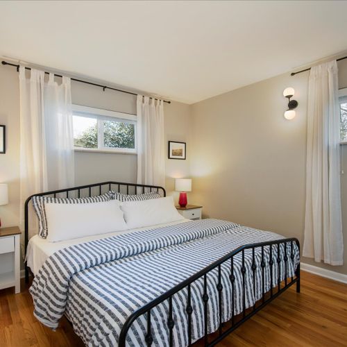 There is a charming master suite with a king bed, a widescreen roku tv, and an ensuite bath.