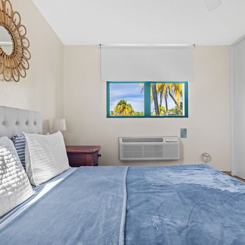 Natural light and a peaceful setting make this bedroom a true retreat.