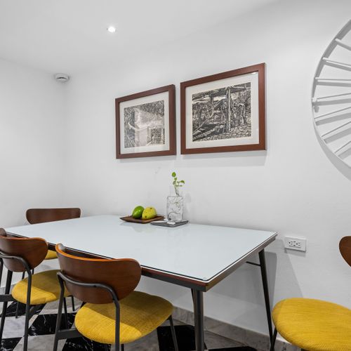 Intimate dining: Bright, simple nook perfect for a quiet meal.