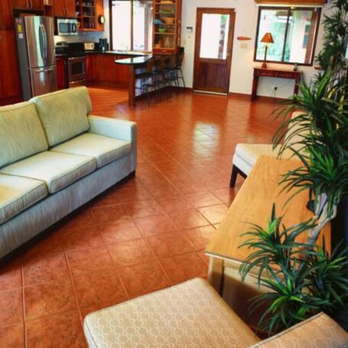 The common areas are well lit and adorned with plenty of plants