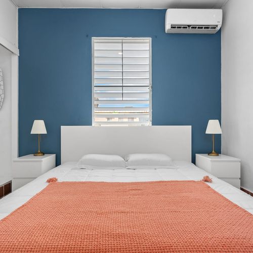 Bright and airy bedroom with a comfortable bed for a restful stay.