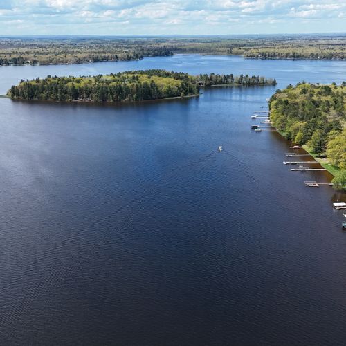 Overall:  a view of the lake with and island in the center