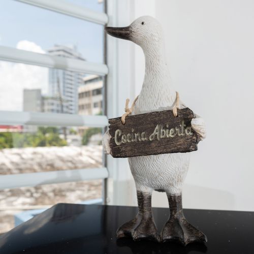 Step into a world of warmth and hospitality as you encounter our delightful duck statue, adding a touch of charm and personality to your experience.