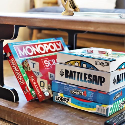 - whole shelf of classic games including monopoly, battleship, scrabble, and more
- ideal for unplugged family nights, rainy days, or friendly competition
- conveniently stored under the coffee table for easy access anytime