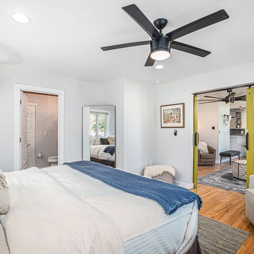 Wake up refreshed in the serene and stylish master bedroom.