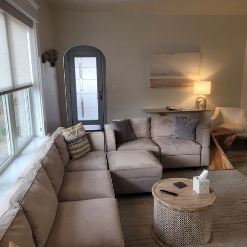 LIVING ROOM:  Gorgeous living room that features a gas fireplace and a large television with live streaming via Hulu, Netflix, and Disney+.