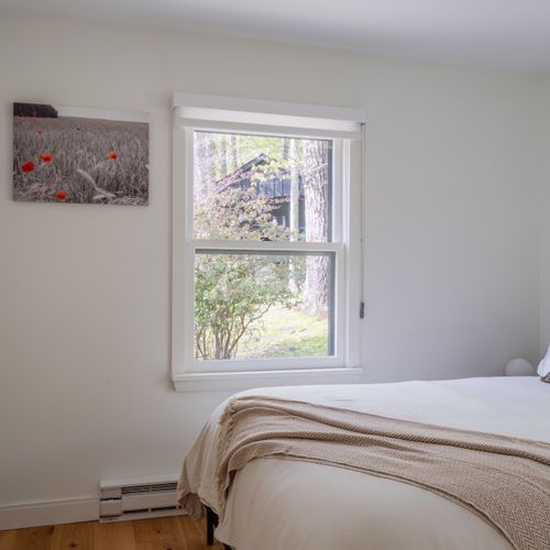 Looking into the second bedroom of the main floor.