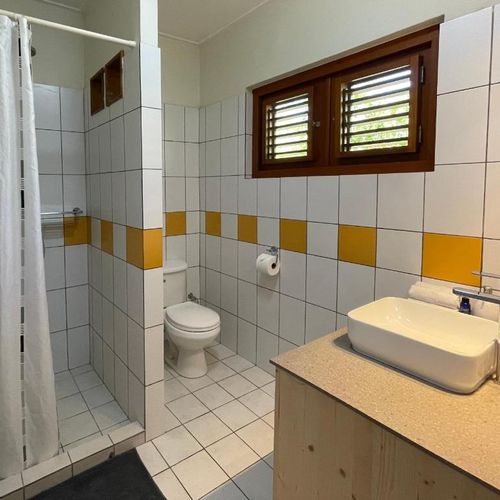 Tiled shower in the bathroom