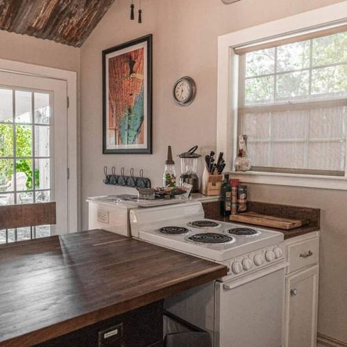 The kitchen comes equipped with all the appliances you could need for your stay in the cabin