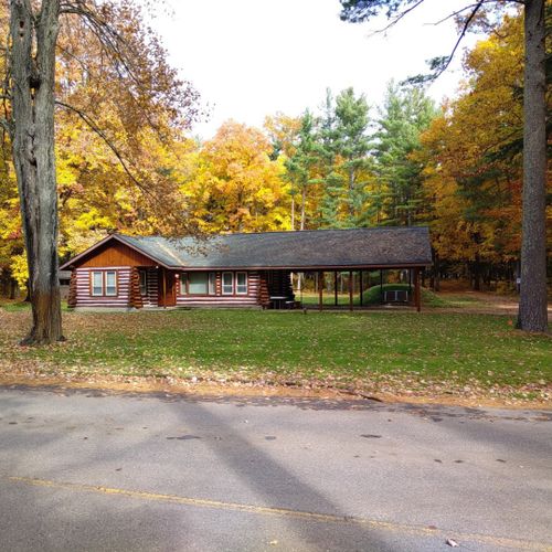 Exterior:  another view of the front of the cabin in fall.