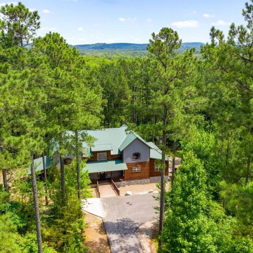 Stay Among the Pines in this luxury cabin that sleeps 20!