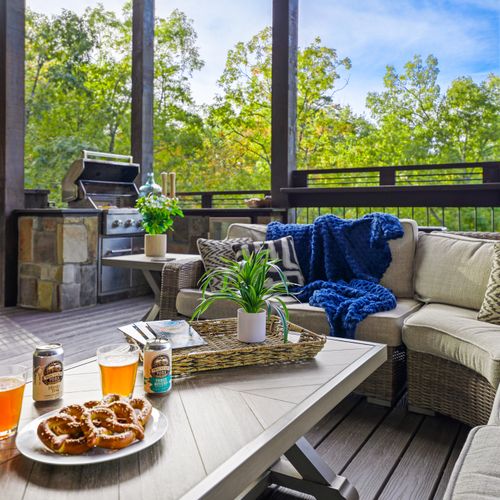 The deck at Glass and Timber has it all—comfort, warmth, views, and unforgettable ambiance.