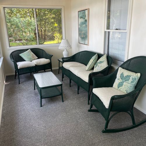 Porch:  the cottage has a beautiful enclosed porch with comfy seating and great views of the lake!