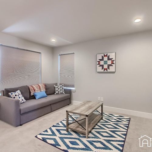 - enjoy extra space in your suite with this comfy sitting area and soft patterned rug
- ideal for morning coffee, quiet reading, or late night streaming
- neutral colors and soft lighting create a calm and welcoming atmosphere