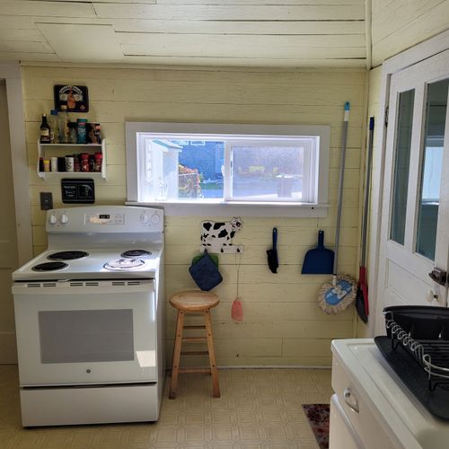 KITCHEN:  The home has a large kitchen with all  appliances, except for a dishwasher.