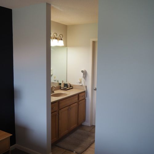 Master bathroom:  this is the private en-suite bathroom for the master bedroom. It's a full bathroom with a combination tub and shower. Note that there is a door that separates the combination tub / shower and toilet from the rest of the bathroom.
