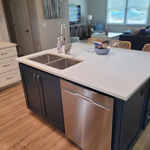 Kitchen:  there is a full kitchen with all-new stainless steel appliances (including a dishwasher), a good supply of cooking and dining utensils, and lots of cupboard and counter space.