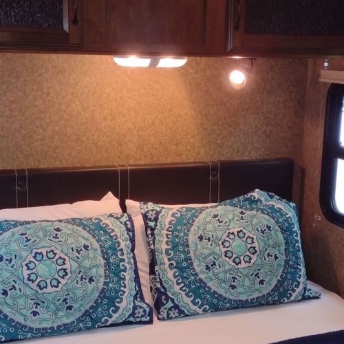 Bedroom #1:  features a queen-size bed, dresser, and a great view of little platte lake.