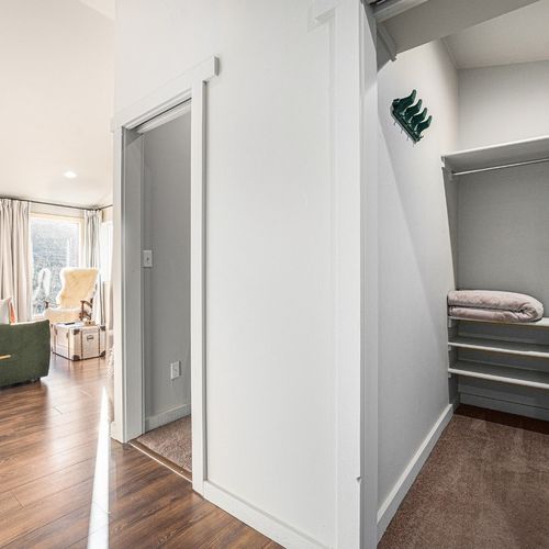 Two spacious walk-in closets in the master suite provide ample storage and organization.