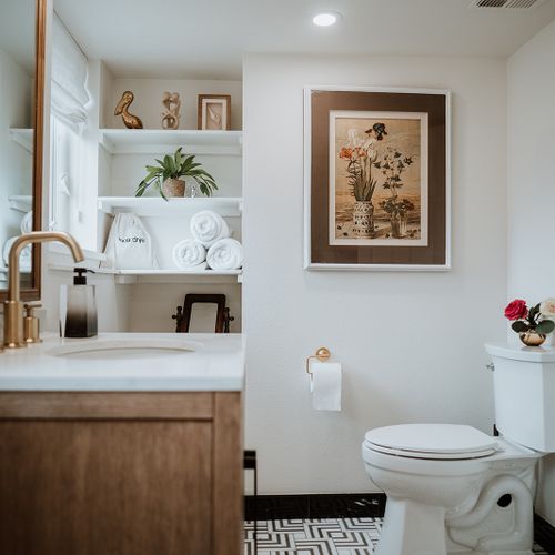 Elegance meets function in our sophisticated mezzanine bathroom. Complete with a walk-in shower, plenty of light, and elevated style.