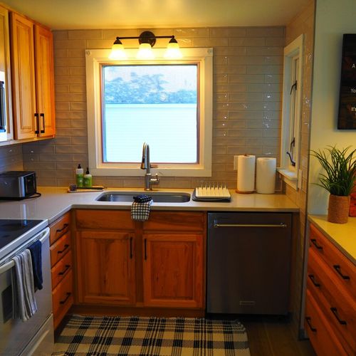 Kitchen:  the cottage has a newly-remodeled kitchen with all modern appliances, including a dishwasher and a little coffee bar. There is also a good supply of cooking and dining utensils provided.