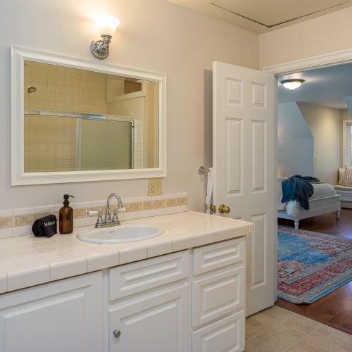 The Yoga Room has a large vanity and storage for your personal items. With a shower/tub combo, you have a private retreat to take a little time for yourself.