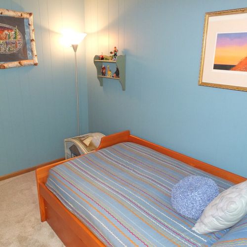Bedroom #3:  features a trundle (i. E. 2 twin beds), a dresser, and a closet.