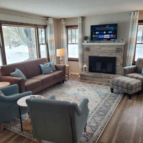 Living room:  the home has a very cute and cozy living room that includes a live streaming television with roku. Note that the indoor wood fireplace is not to be used by guests as it is unsafe to use!