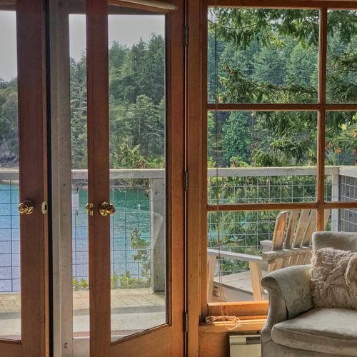 Master bedroom private balcony overlooking Grindstone Harbor