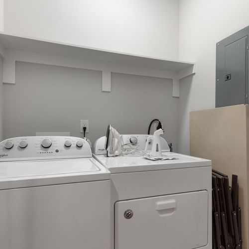 Top unit: Washer and dryer in unit