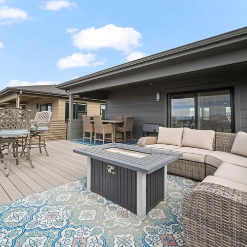 Sunny deck hangout spot perfect for coffee mornings and sunset wine.