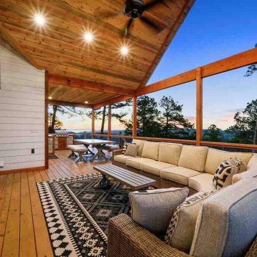 The outdoor dining and kitchen area area also upstairs on the covered patio!