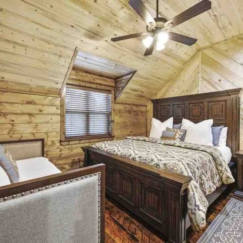 Upstairs Master Suite 4 featuring a day bed trundle for extra sleeping spots.