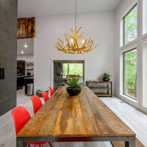 The antler chandelier adds a rustic touch.