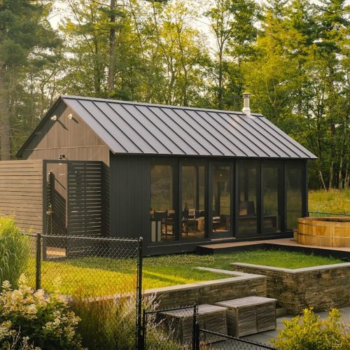 The Pool House with outdoor shower and hot tub located just to the left of the Main House