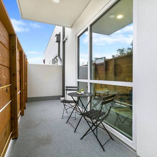 Unwind at the private outdoor seating area — perfect for morning coffee or evening chats.