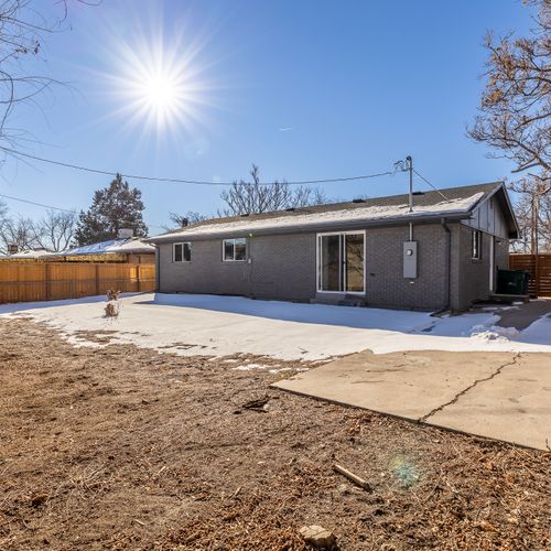 The fenced in backyard is huge and the perfect place to hang out and play games with your group!