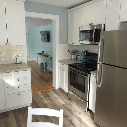 Kitchen:  an overview of the newly remodeled kitchen that features all stainless-steel appliances