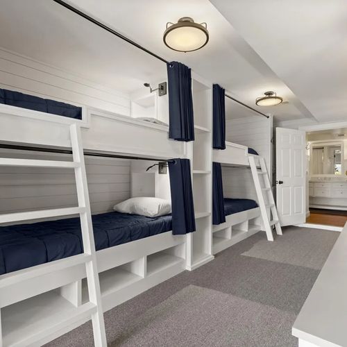 BEDROOM #5 (LOWER LEVEL):  Features 2 built-in bunk beds (sleeping 4 people in total) along with a secondary washer and dryer.
