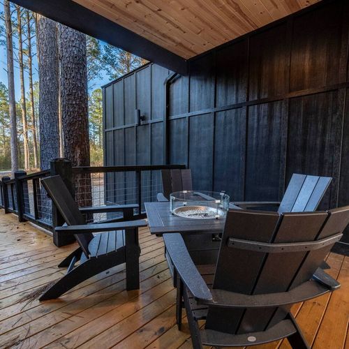 Intimate 4-person table with build in firepit!