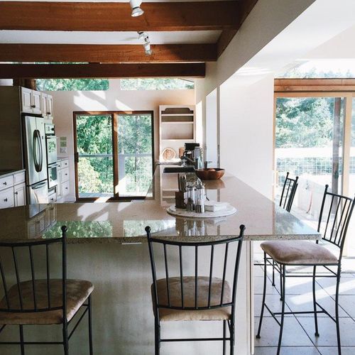 Large gourmet kitchen with counter dining.