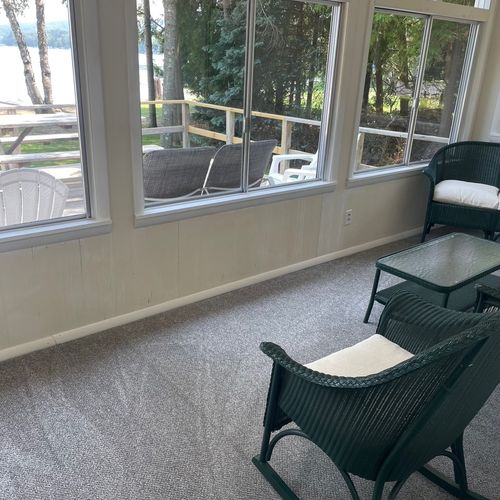 Porch:  the cottage has a beautiful enclosed porch with comfy seating and great views of the lake!